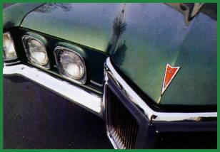 1970 GP headlamps, grille, hood emblem